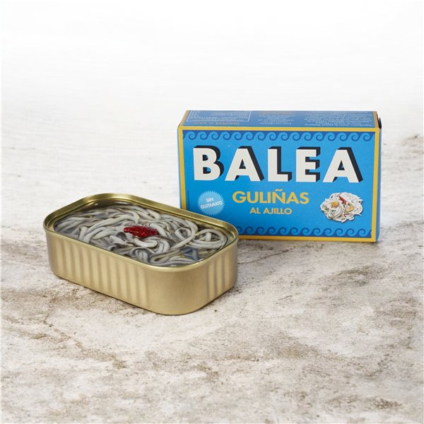 La traducción al alemán de "GULIÑAS AL AJILLO BALEA 115 GR" sería: 

"GULIÑAS IN KNOBLAUCHSOßE BALEA 115 GR" 

Ten en cuenta que "GULIÑAS" podría necesitar una aclaración si no es un término común en alemán.-detalle