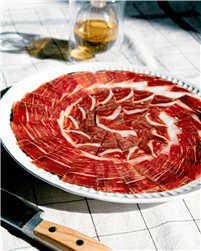 Jambon de bellota 100 % ibérique tranché à la main, 100 g.