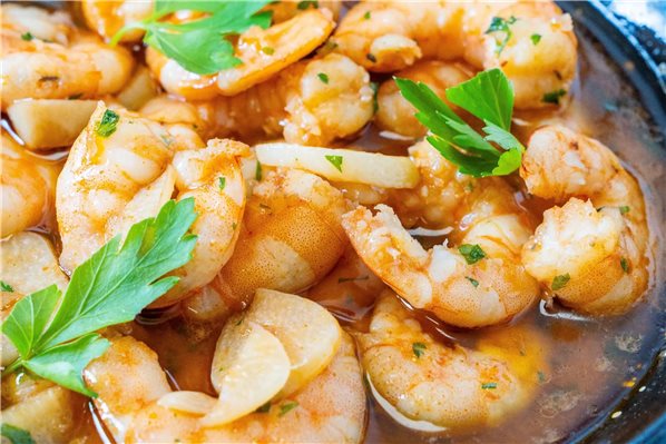 Crevettes à l'ail avec de l'huile d'olive extra vierge biologique-lateral