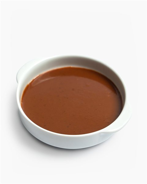 La traducción de "Salsa de carne al vino tinto" al alemán es "Fleischsauce mit Rotwein".-detalle