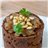 Timbale de boudin avec oignons caramélisés et pignons de pin-lateral
