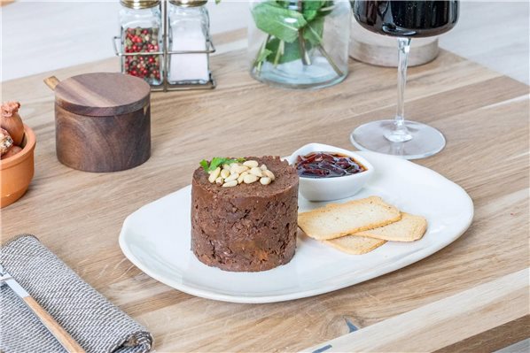 Timbale de boudin avec oignons caramélisés et pignons de pin-trasera
