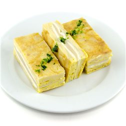 Stuffed tortilla with turkey breast and cheese.