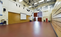 Photograph of  G037 Main Hall with Bleacher Seating, St James School