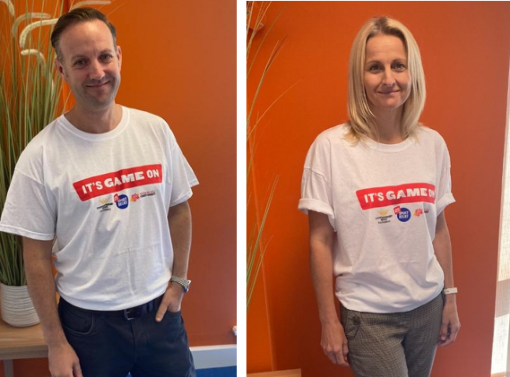 Managing Director Tom Lyons and Operations Director Susan Webster showing their support for the cause by wearing our Move 22 fundraising t-shirts!