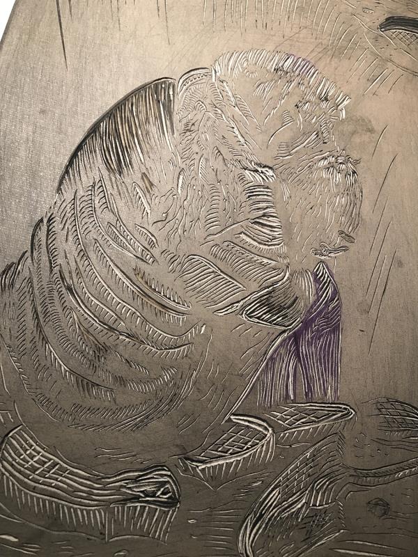 At the foot of the ravine.