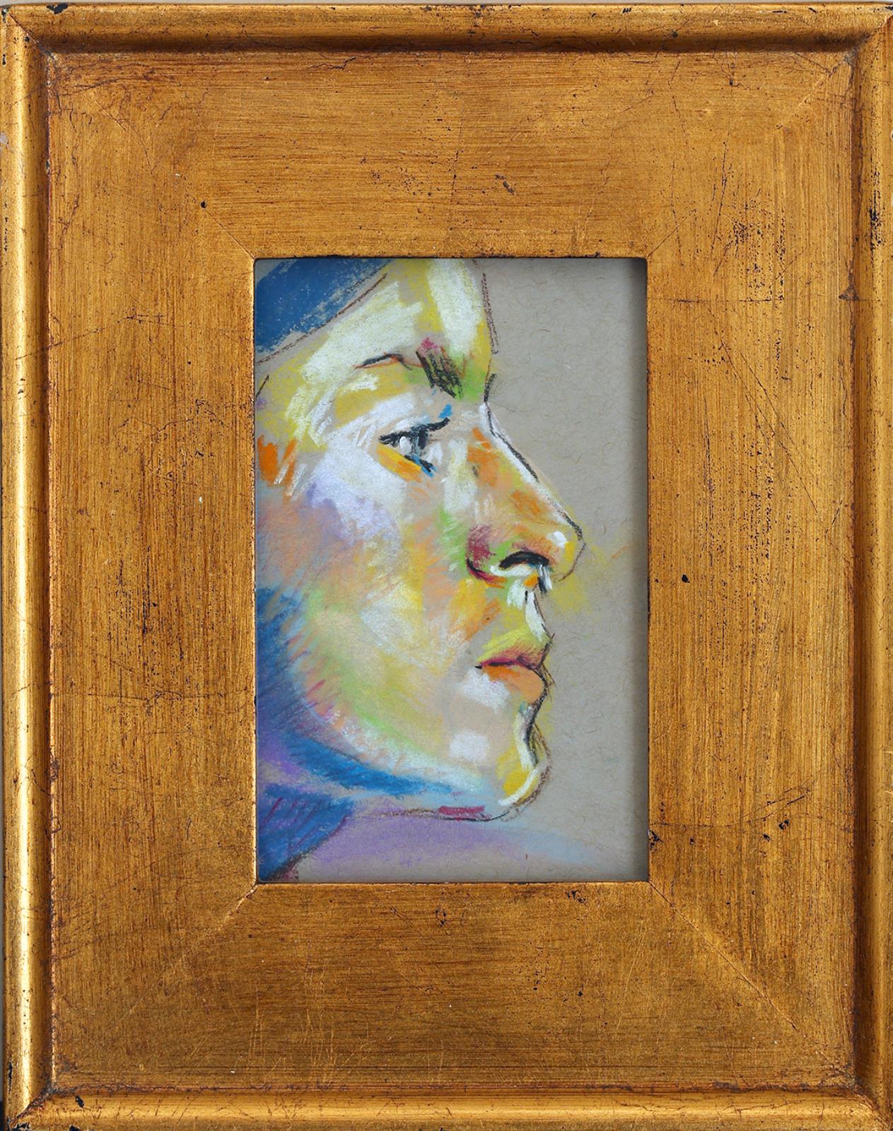 Profile of a woman in gold frame