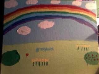 rainbow over flowers