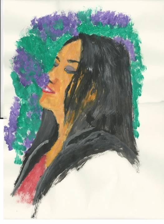 Smelling lilac flower
