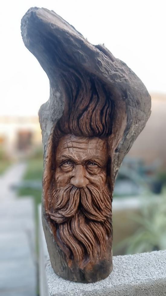 Old man carving