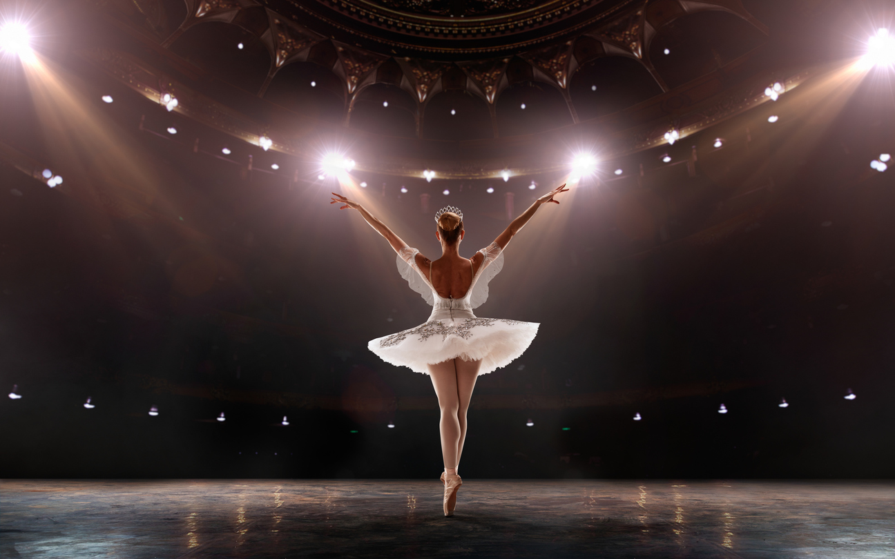 ballet dancer on pointe taking a bow