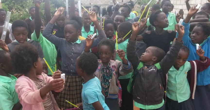 Building classrooms and sanitation facilities.