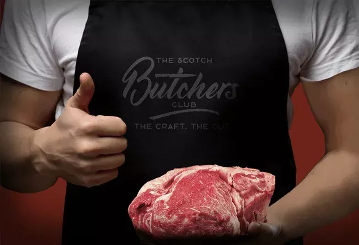 Butchers club apron with red meat