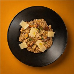 Arroz meloso de setas de temporada y parmesano