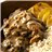 Contras de pollo de corral deshuesadas en salsa de setas, arroz y patatas-detalle