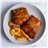 Costilla en salsa de mango con patatas-lateral