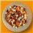 Ensalada de calabaza asada, lentejas, queso feta, asadillo, tomate seco y pistachos