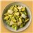 Fusilli al pesto verde, brócoli, pollo marinado y parmesano