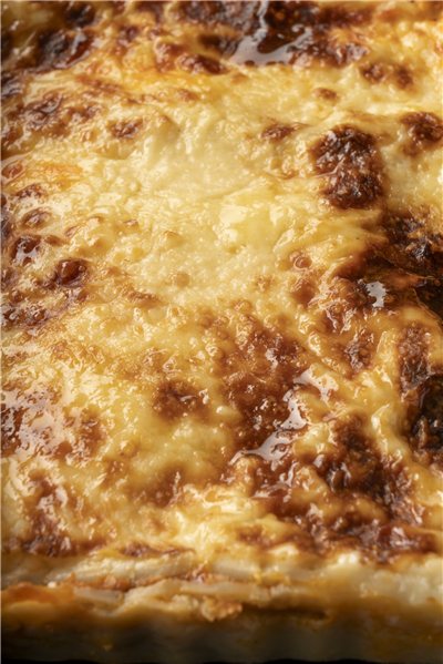 Lasaña de verduras y setas con bechamel de romesco-lateral