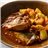 Merluza en salsa de tomate y hierbas con vegetales asados al horno-detalle