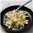 Pasta cremosa con bacon y coles