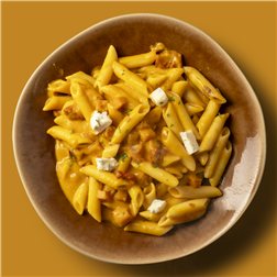 Penne rigate con calabaza asada, tomate seco y queso Gorgonzola
