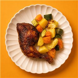 Pollo de corral asado a la Peruana con vegetales al horno