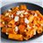 Rigatoni con salsa de tomate, berenjena y queso de cabra-lateral