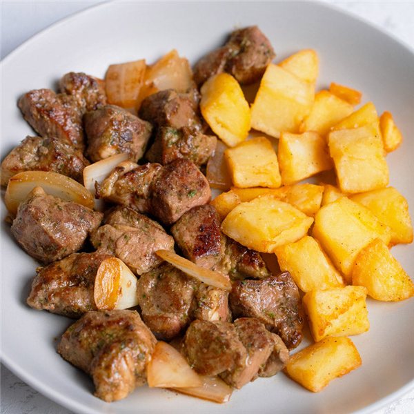 Salteado de presa con patatas-detalle
