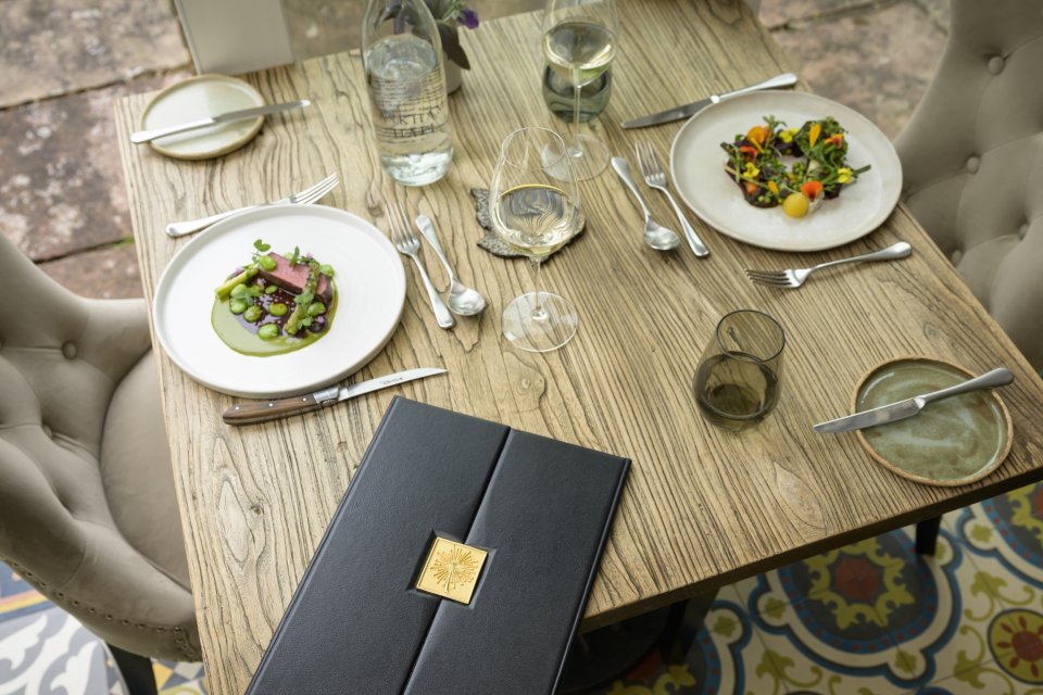 Tasting menu with a glass of fizz on arrival