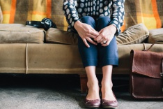 Woman sitting on a sofa