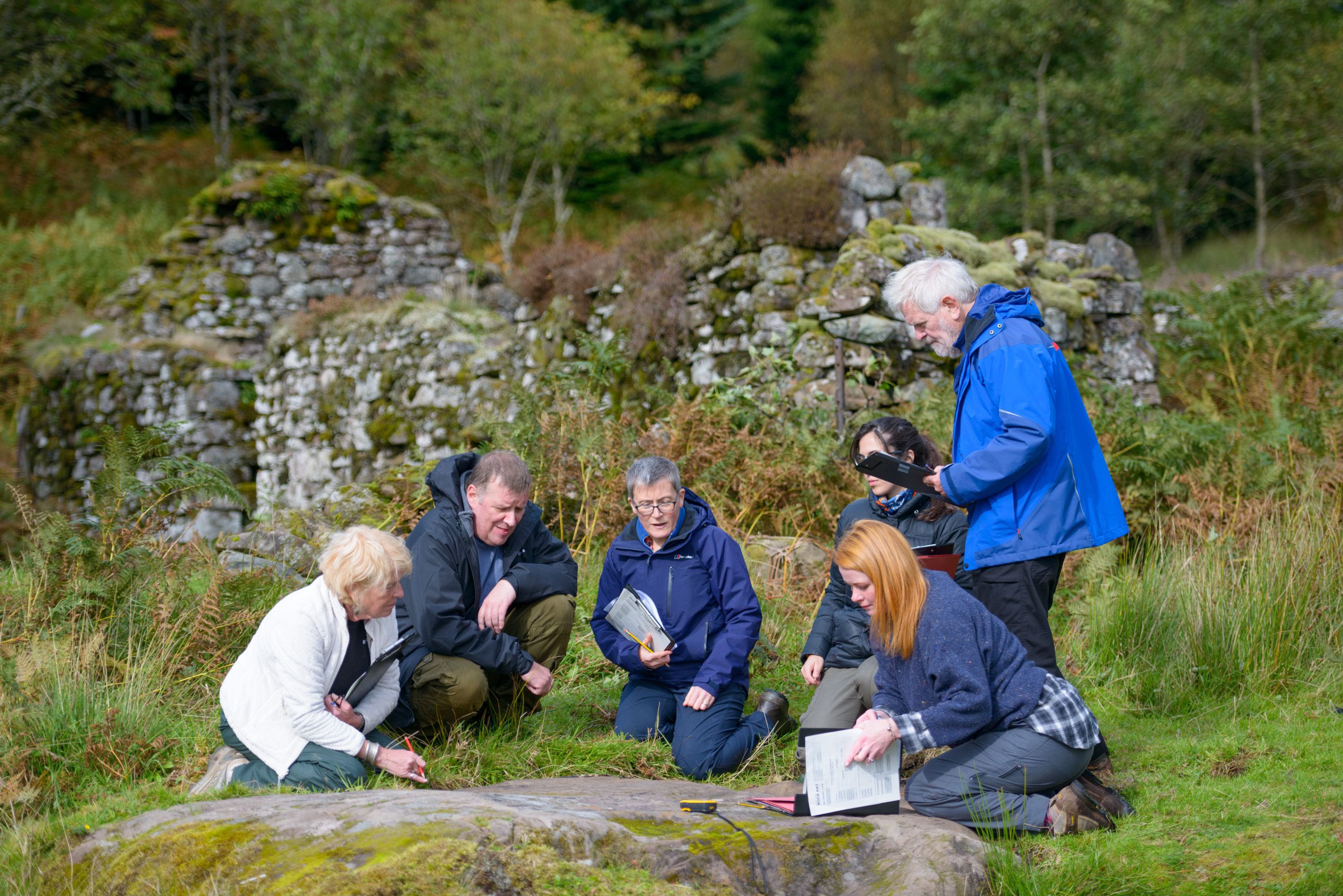 Sarah provides training to new community team volunteers near Callander