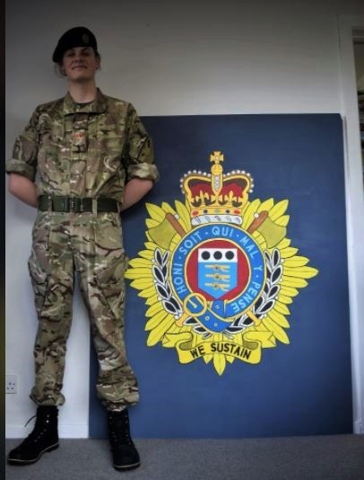 LCpl Burke with his painting