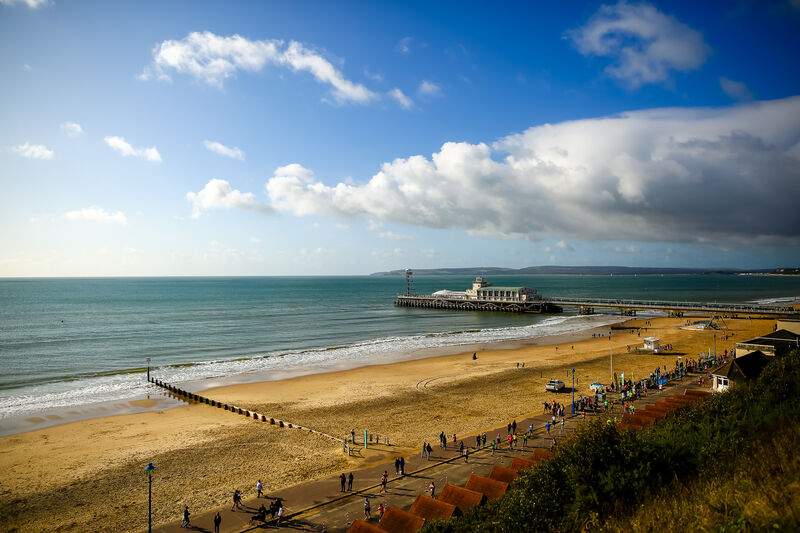 Photo of Bournemouth beach with blue sky and a few clouds