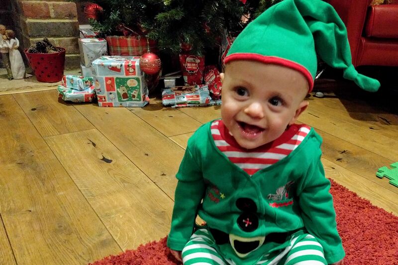 Baby dressed as an elf