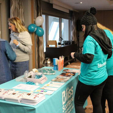Women at a Bliss Scotland stall