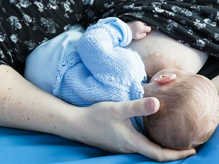 Mother breastfeeding her baby