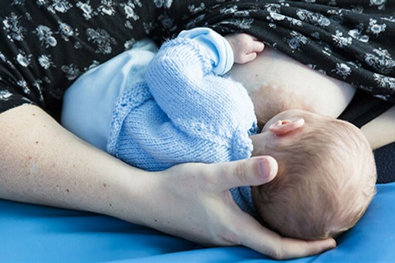 Mother breastfeeding her baby