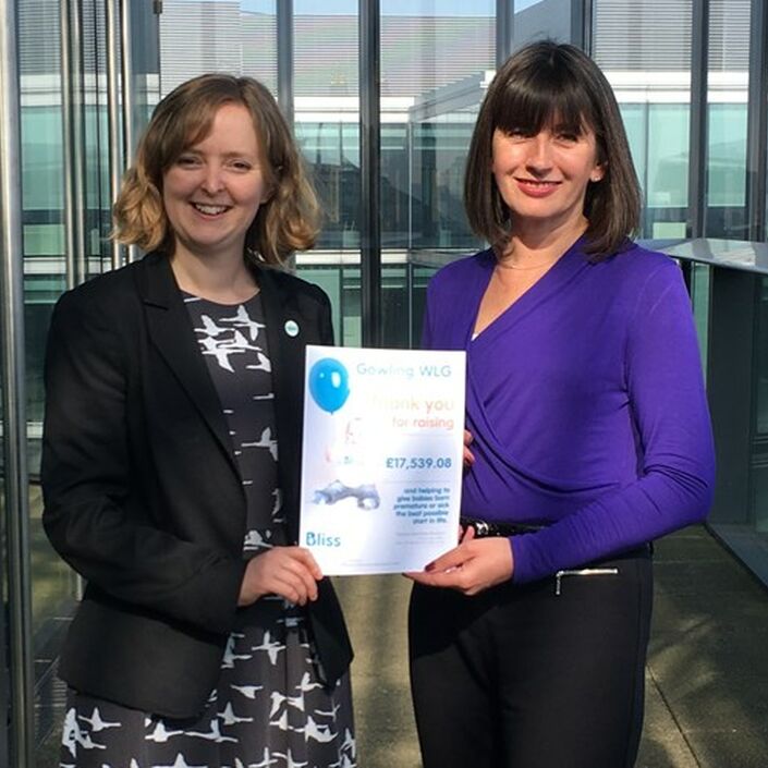 Presenting certificate of money raised for Bliss