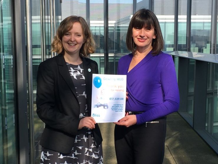 Presenting certificate of money raised for Bliss