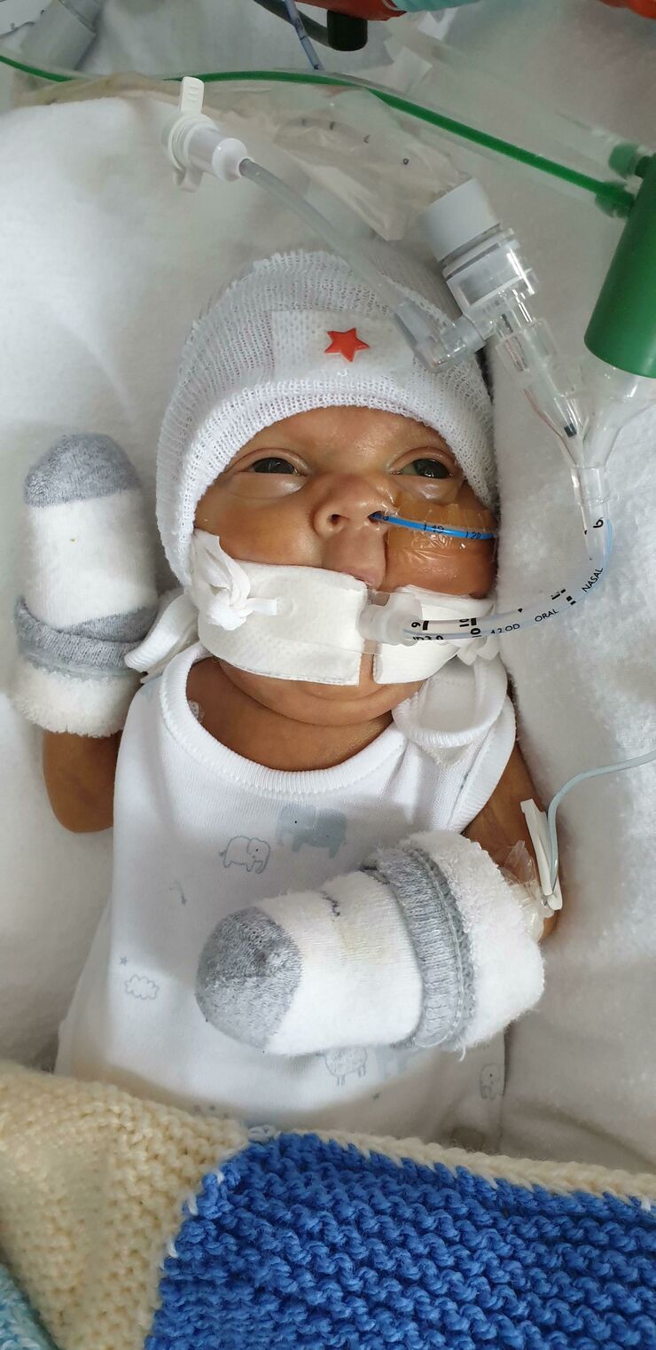 Ethan's baby Oliver on the unit