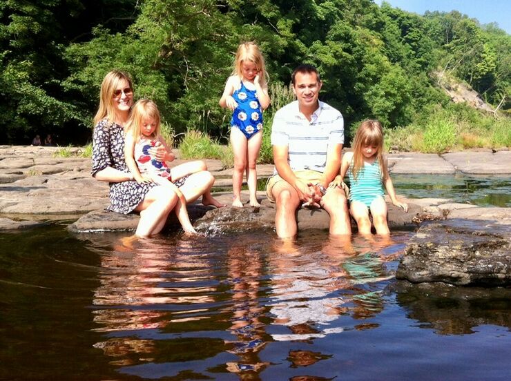 Kate, Holly and Jessica with Anna and their dad at a stream
