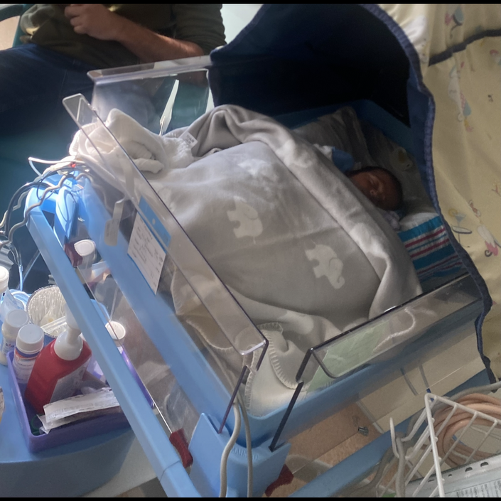 Iram's baby Adam in an incubator on the neonatal unit