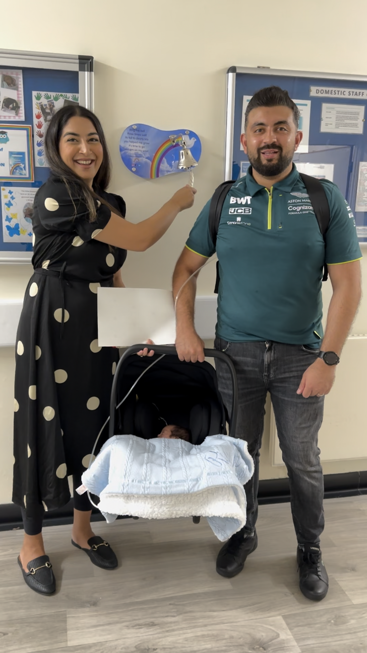 Farhaa and Wasim with Riyadh, ringing the bell ready to leave the unit