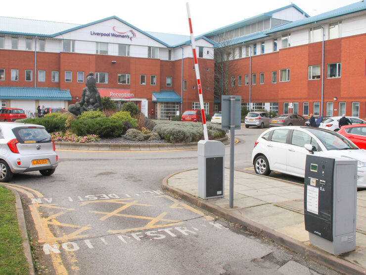 Hospital car park with cars parked