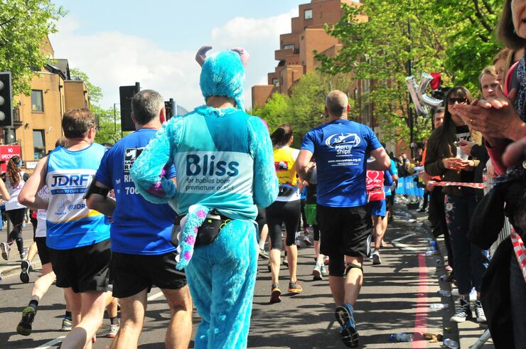 Man dressed as monsters inc character running for Bliss