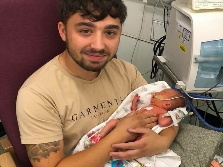 Mitchell Cutting With Son Louis Hero Image Rs