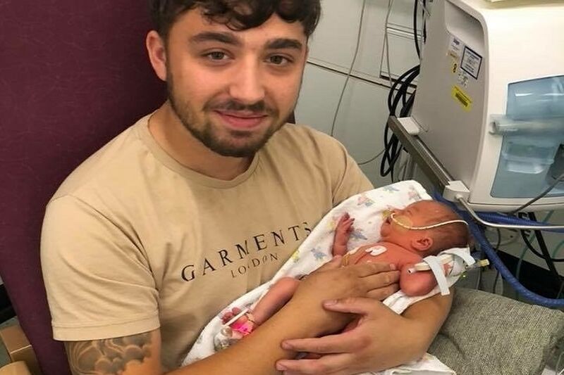 Mitchell Cutting With Son Louis Hero Image Rs