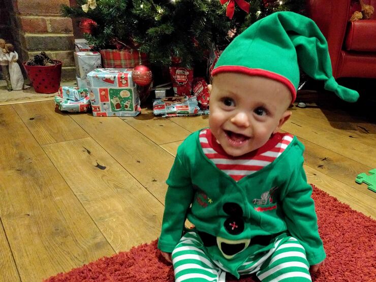 Baby dressed as an elf