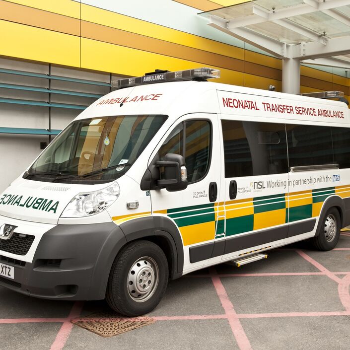 Photo of an ambulance outside a hospital